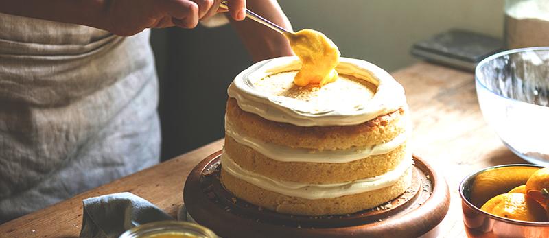 Orange cream layer cake with vanilla frosting