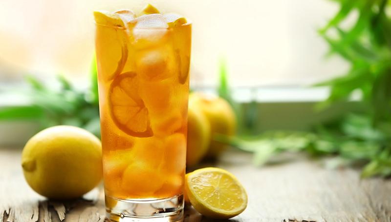 Tall glass of lemon iced tea