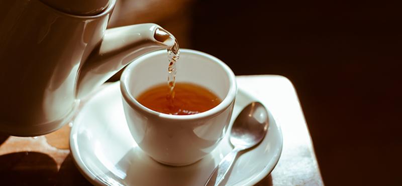 tea kettle pouring hot tea